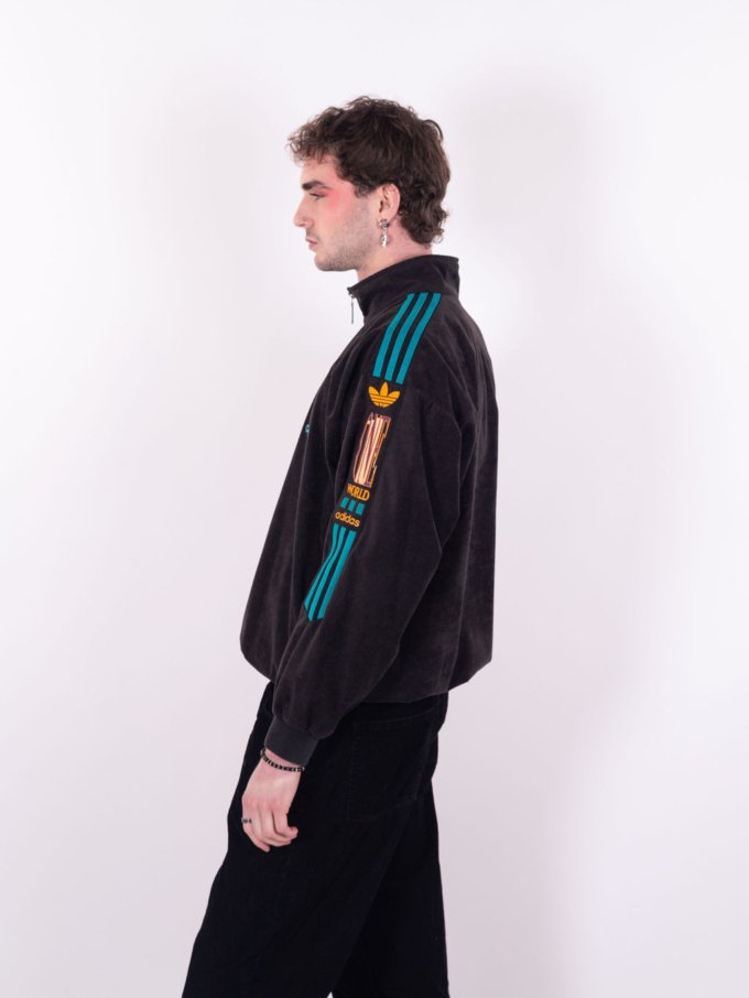 Veste vintage Adidas-One World de couleur noire et turquoise - profil