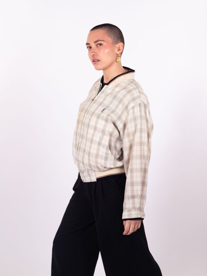 Veste vintage Yves Saint Laurent type bomber beige motif quadrillé avec logo brodé bleu